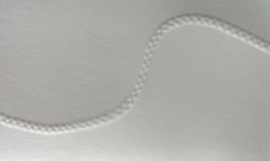 Blind embossed three strand braid